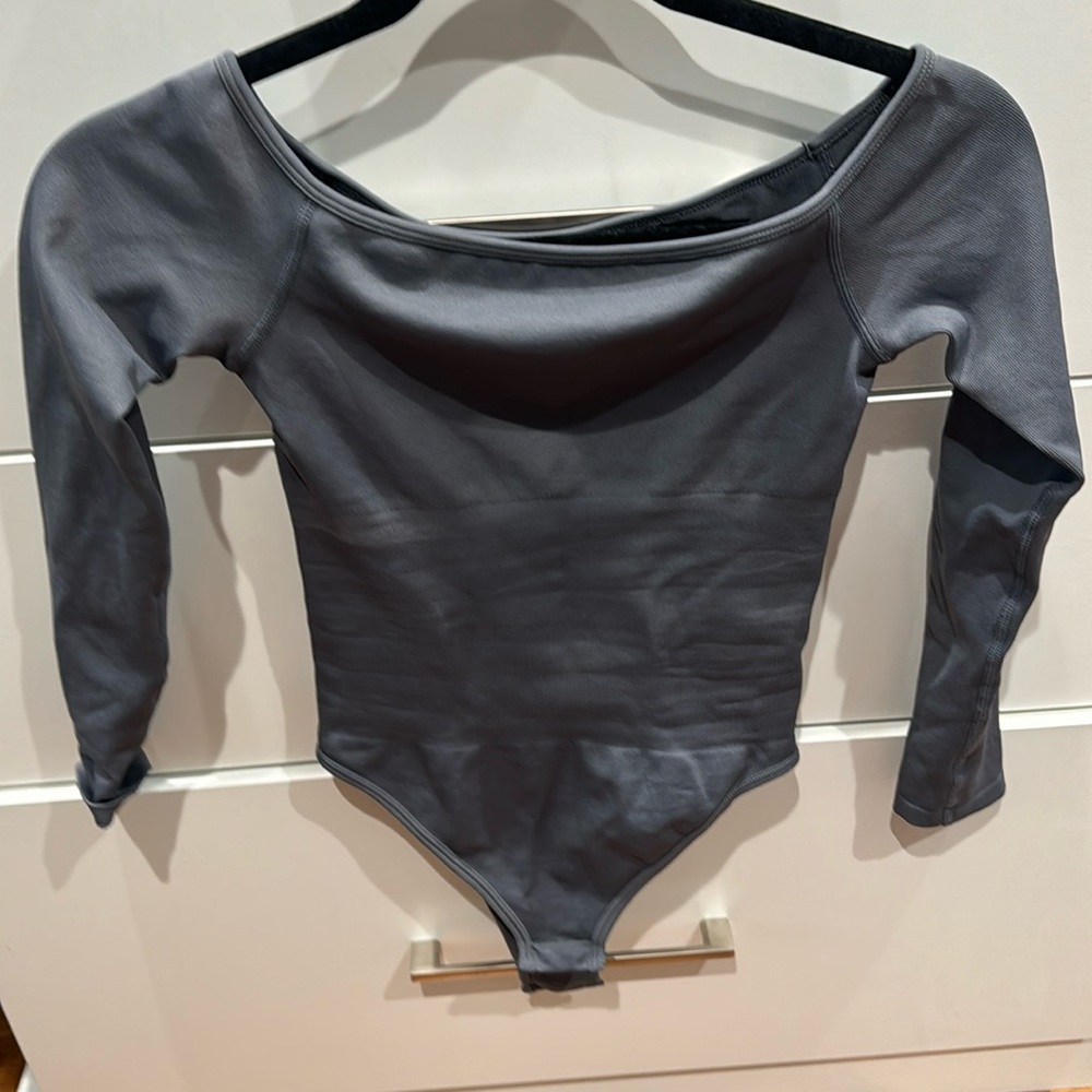Off the shoulder, gray bodysuit 90% nylon 10% spandex size small